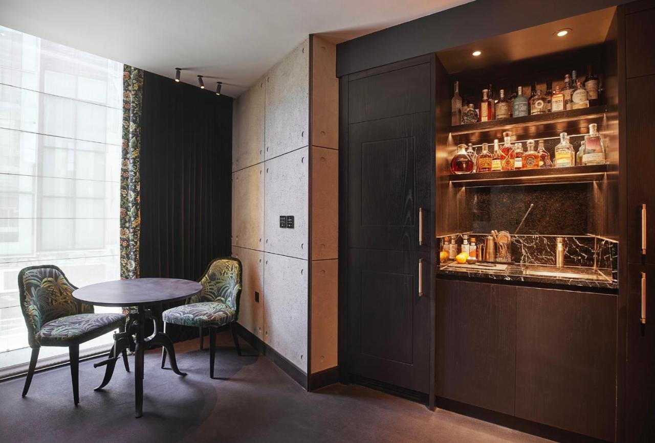 Chateau Denmark Londra Esterno foto A wet bar in a hotel room